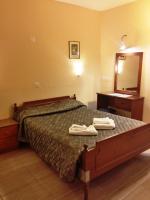 Postel nebo postele na pokoji v ubytování Minaides Hotel