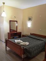 Postel nebo postele na pokoji v ubytování Minaides Hotel