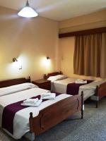 Postel nebo postele na pokoji v ubytování Minaides Hotel