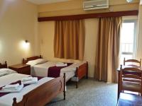 Postel nebo postele na pokoji v ubytování Minaides Hotel