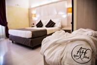 Agape Hotel AA Hotelsにあるベッド