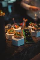 a table topped with different types of food at Hotel Windsor in Laigueglia