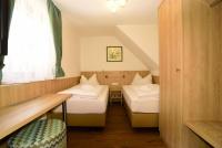 Postel nebo postele na pokoji v ubytování Apart of me Ferienhaus Faaker See