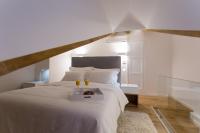 Posteľ alebo postele v izbe v ubytovaní Bifora Heritage Hotel
