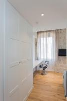 Televízia a/alebo spoločenská miestnosť v ubytovaní Bifora Heritage Hotel