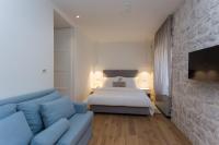 Posteľ alebo postele v izbe v ubytovaní Bifora Heritage Hotel