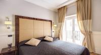 Posteľ alebo postele v izbe v ubytovaní 939 Hotel
