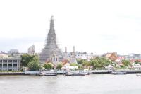 a view of a large building next to a river at Riva Arun Bangkok in Bangkok