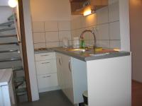 Kuchyň nebo kuchyňský kout v ubytování Apartments MIME - Small House