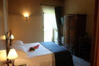 Posteľ alebo postele v izbe v ubytovaní Hotel Le Botti