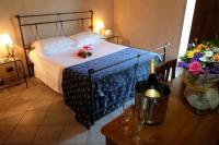 Posteľ alebo postele v izbe v ubytovaní Hotel Le Botti