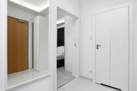 Posteľ alebo postele v izbe v ubytovaní Apartament Nadmorski Gold
