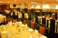 En restaurant eller et andet spisested på De Vivendi Resorts, Manali with 35000 Sqft Open Lawn