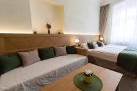 Postel nebo postele na pokoji v ubytování Karlova 25 Apartments