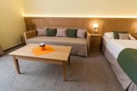 Postel nebo postele na pokoji v ubytování Karlova 25 Apartments