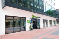 a store front of a building on a street at Holiday Inn Express - Recklinghausen in Recklinghausen