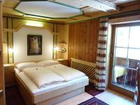 Łóżko lub łóżka w pokoju w obiekcie Hotel Gasthof Islitzer