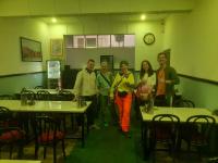a group of people standing in a room with tables at HOTEL SATYA in Dehradun