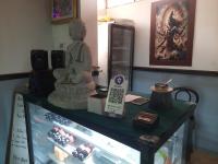 a display case with a statue on top of it at HOTEL SATYA in Dehradun