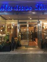 Una tienda con un cartel azul en el frente. en Casa Maria with Pool, Terace & Amazing View - near Beach, Golf, Town & Relax - 1-6 Guests, en Rojales