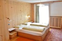 Posteľ alebo postele v izbe v ubytovaní Hotel Garnì al Plan