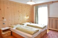 Posteľ alebo postele v izbe v ubytovaní Hotel Garnì al Plan