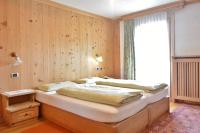 Posteľ alebo postele v izbe v ubytovaní Hotel Garnì al Plan