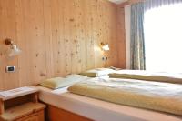 Posteľ alebo postele v izbe v ubytovaní Hotel Garnì al Plan