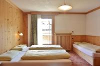 Posteľ alebo postele v izbe v ubytovaní Hotel Garnì al Plan