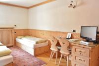 Posteľ alebo postele v izbe v ubytovaní Hotel Garnì al Plan