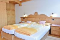 Posteľ alebo postele v izbe v ubytovaní Hotel Garnì al Plan