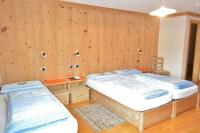 Posteľ alebo postele v izbe v ubytovaní Hotel Garnì al Plan