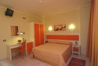 Posteľ alebo postele v izbe v ubytovaní Hotel Cristal Eboli