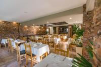 En restaurant eller et andet spisested på Villa don Tomás