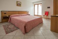 Posteľ alebo postele v izbe v ubytovaní Residence Betulla Molveno