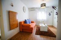 Posezení v ubytování Floral Apartment