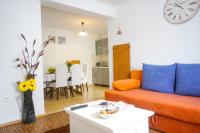 Posezení v ubytování Floral Apartment