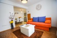 Posezení v ubytování Floral Apartment