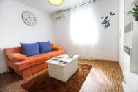 Posezení v ubytování Floral Apartment