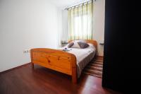 Postel nebo postele na pokoji v ubytování Floral Apartment