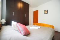 Postel nebo postele na pokoji v ubytování Floral Apartment