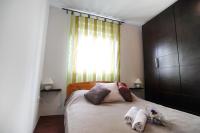 Postel nebo postele na pokoji v ubytování Floral Apartment
