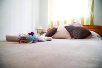 Postel nebo postele na pokoji v ubytování Floral Apartment
