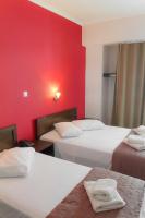 Posteľ alebo postele v izbe v ubytovaní Athens Choice Hotel