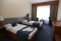 Postel nebo postele na pokoji v ubytování Hotel Theresia