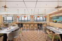 Εστιατόριο ή άλλο μέρος για φαγητό στο Home2 Suite by Hilton Xinzhou Ancient City