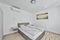 Posteľ alebo postele v izbe v ubytovaní Villa Oliver 2 Siófok