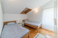 Posteľ alebo postele v izbe v ubytovaní Seaside Apartment Barić Draga
