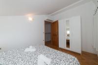 Posteľ alebo postele v izbe v ubytovaní Seaside Apartment Barić Draga