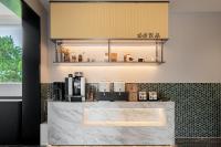 Η κουζίνα ή μικρή κουζίνα στο MisooHi Hidden Realm Hotel (Huangshan Tunxi Old Street Branch)